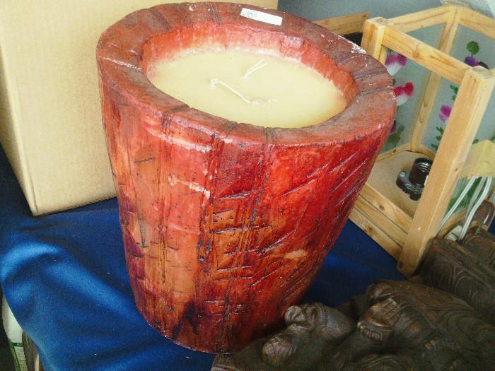 This candle is 12" high and 10.5" across. Price tag states (retail) $175.00!!!!