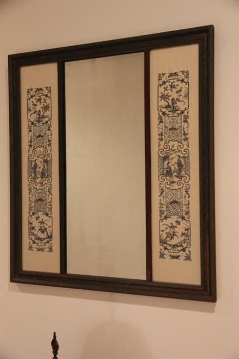 mirror in hallway....frame contains silk panels