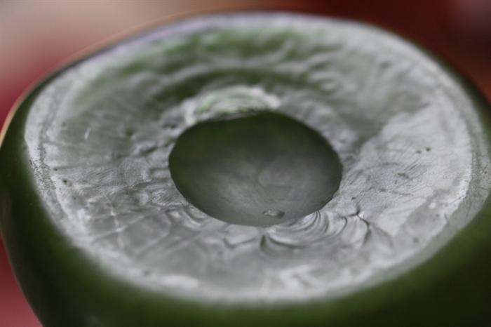 underside of green art class vase