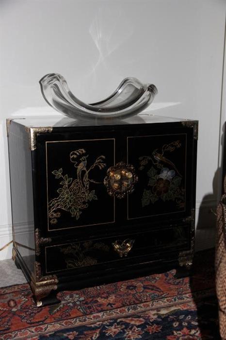 lucite bowl on Asian storage chest (one of a pair)