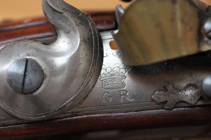 mark on flintlock reenactor's rifle