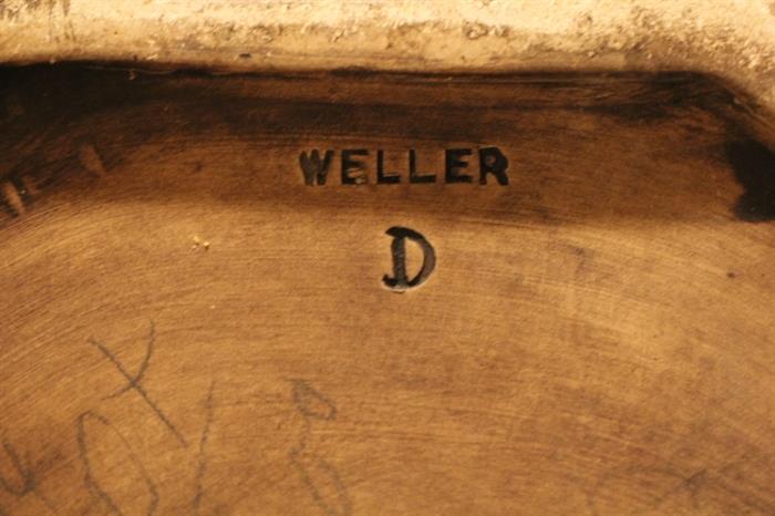 mark on underside of Weller umbrella stand