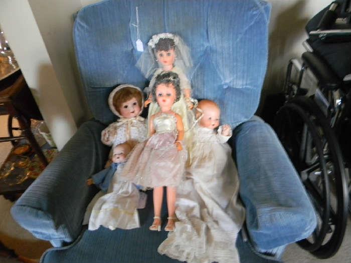 Some of the dolls, Wheel chair with attachments, blue recliner 