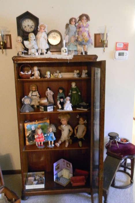 some of the dolls, a few were shy for photos I will add more, neat old shoe store chair, great clocks