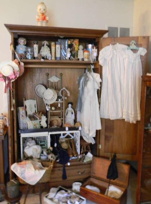 Antique wardrobe, filled with antique dresses, high button shoes and purses, and more goodies