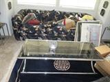 GLASS AND CHROME SOFA TABLE, SOFA, RUG