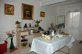Oil Paintings and Porcelain Flowers and Candelabras
