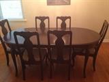 vintage ding table with two captain's chairs