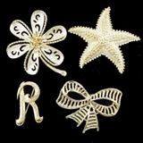 Lot of 4 Goldtone Brooches. Lee "R" Initial. Gerrys Bow. Unmarked flower & Starfish
Condition: Very Good
Shipping: Yes
Size: 1.25"-2.25"