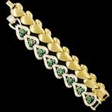 Set of Two Goldtone Bracelets. Hearts with Green Rhinestones and Wavy Twist.
Condition: Very Good
Shipping: Yes
Size: 7"/7.5"