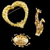 Lot of 3 Goldtone Brooches. J.J. Heart. Ladybug. Giraffe.
Condition: Very Good
Shipping: Yes
Size: 1.75"-2.5"