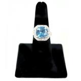 Sterling with Gold Overlay Cocktail Ring With Blue And Clear Rhinestones. Marked 925.
Condition:Very Good
Shipping: Yes
Size: 7.5