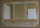 mirror and hanging pegs