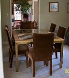 Glass top Burl wood Dining table has glass top insert that triples the size of the table top.