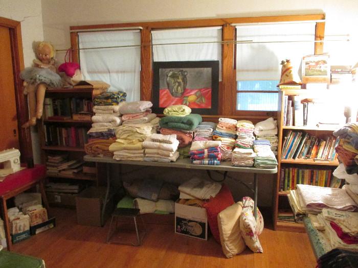 This is another neat room.  The books in the right bookshelf are school age late 50s early 60s.  We are not through arranging the books on the left, but if you are a book hound or wanting to make money on the internet, be sure and scour the books at this sale!