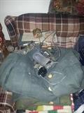 that is military...wow what a terrible pic. WWII jacket, headphones 
