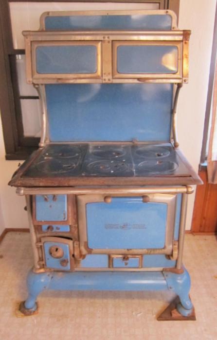 Very good antique Quick Meal blue enameled wood cook stove w/warming ovens