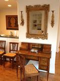 19th Century Italian writing table with leather book detail with beautiful wood inlay. Antique swedish dining chair set with lyre back and rush seats.