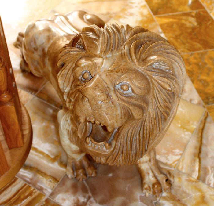 Antique Onnox lion ( x 2 ) aprox 3ft by 2 ft wide