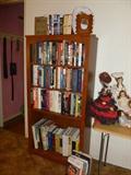 Lots of books and a nice bookcase to hold them