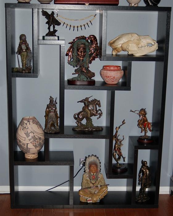 Modern contemporary black bookcase etagere. Some of the staues, pottery and skull are not for sale