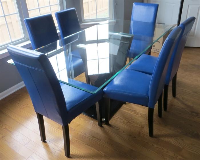 Modern contemporary glass table and 6 blue parsons chairs