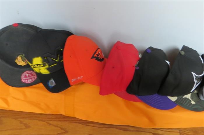 Assorted sports caps...new