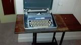 Typewriter and table