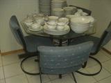 Cute glass top dinette & HUGE set of china about 200 pieces priced at only 40.00
