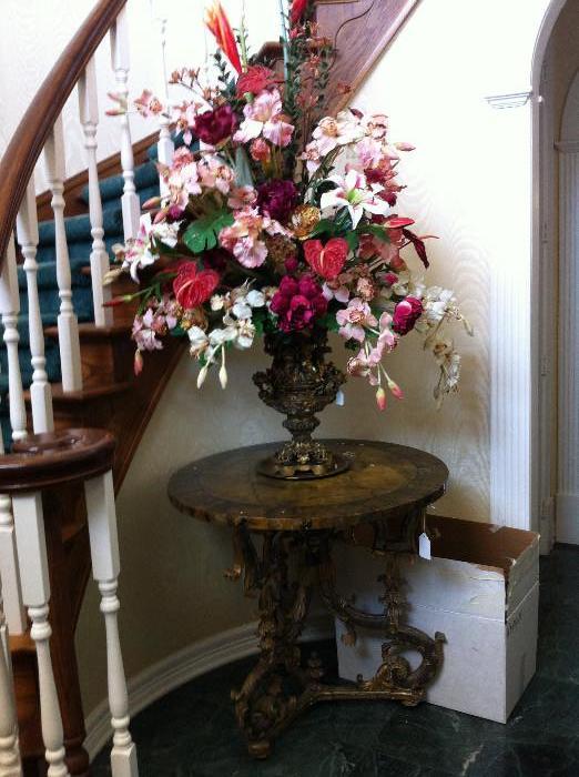   lovely custom floral arrangement; antq.round table