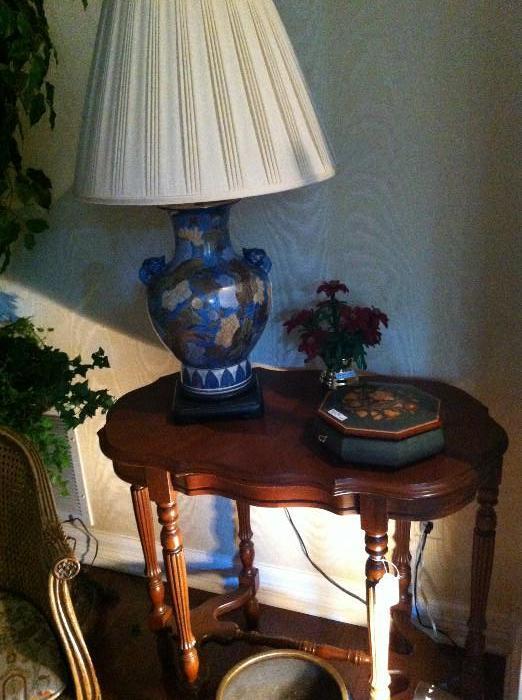              small 6-legged side table; lamp; inlaid box