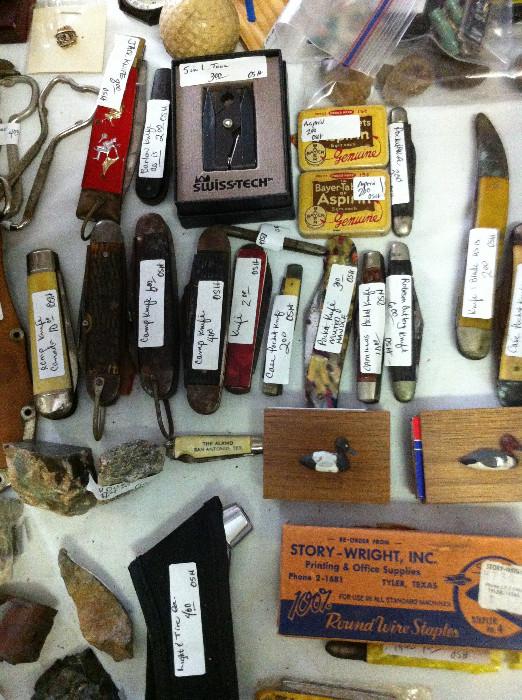               many pocket knives; Tyler memorabilia 