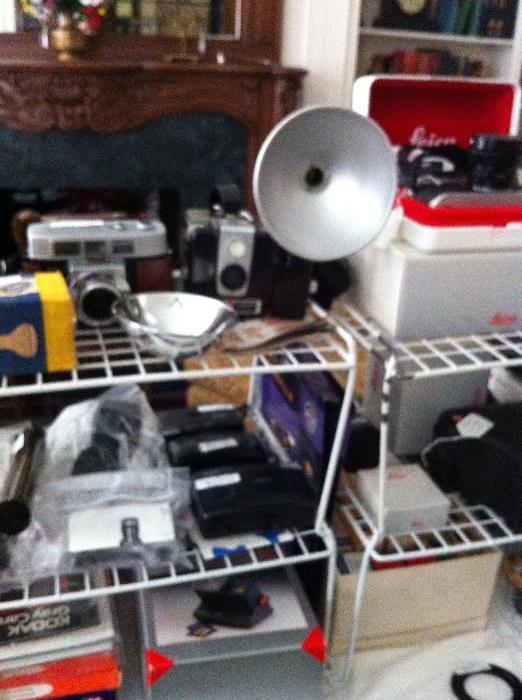HUGE amt.of cameras & equip. (Leica, Kodak, Cannon, tripods, cases, lens);