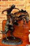 Frederic Remington bronze "Bronco Buster" (32" tall x 24" wide x 15" deep)