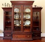 1880's walnut three tiered china cabinet; Sterling candelabras