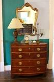 Hepplewhite style mahogany chest of drawers, Alabaster table lamp;  Brass student lamp;  Mid century gilded mirror
