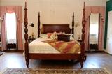 Elegant mahogany four poster king bed