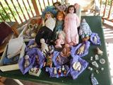 some of the many dolls. The one in pink is Armand Marseilles. Bisque, Composition, and celluloid dolls.
