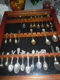 Collections of so many things including spoons. The sterling ones will be in the bid only room.