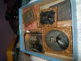 This is a box of tin types. There are also dageurotypes and other early photos.