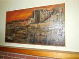 This painting is signed J. Dudley '71.  It is a modern painting depicting a mountain side.