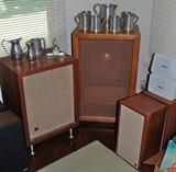 JBL/Lansing Custom 12-inch extended-range speaker(center), JBL/Lansing C-36 Custom speaker made as the mate to the one in the center. AR 4X Walnut Speakers on the right & Bose 101s on top.