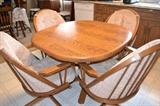 Solid wood dinette with four comfy chairs