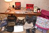 Costume jewelry and lots of purses, carryall and small luggage bags. Men's watches and jewelry too.