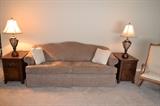 Practically brand new sofa, end tables and lamps plus a great rocking chair.
