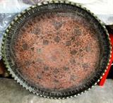 Top View of the hand tooling for Vintage Oriental Brass Table top...or large tray if you prefer with hand tooled brass top,  (Brass Table / tray is likely circa 1940's) Has  intricate hand tooled designs around the table top / tray.  Brass table top is believed to be made in the Phillipines after the Japanese surrendered...from WW2 expended brass artillery shells