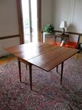 Cherry drop leaf table; 36 x 57" wide