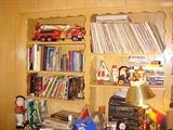 lot of books, records and toys, stereo with speakers and more