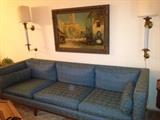 fabulous oil painting over a very mid century sofa