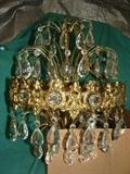 Beautiful 3 tiered Crystal and Brass Chandelier approx. 21" x 14"